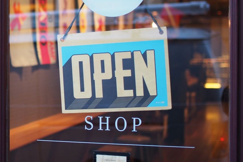 Shop - gray and blue Open signage