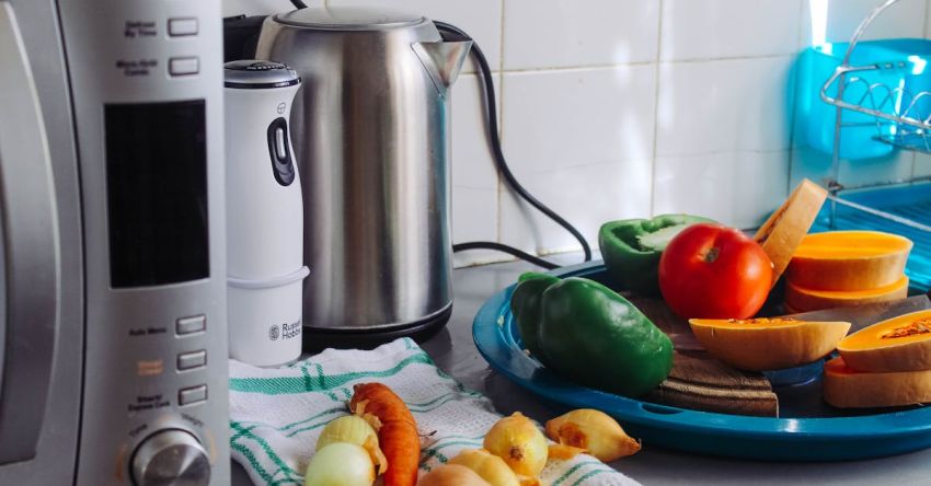 Appliances - Photo of Vegetables Beside Gray Electric Kettle