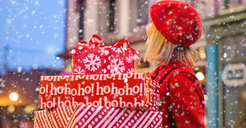 Holiday Shopping - Woman Holding Three Red Christmas Presents Boxes