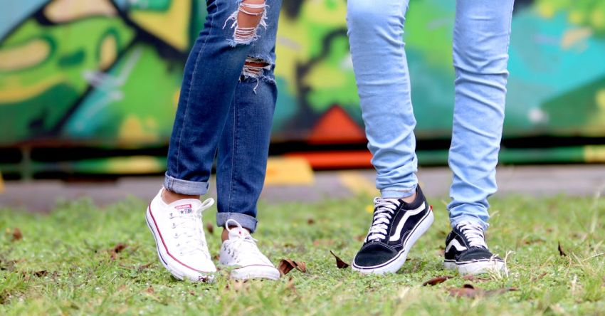 Stylish - Person's Wearing White and Black Low-top Sneakers