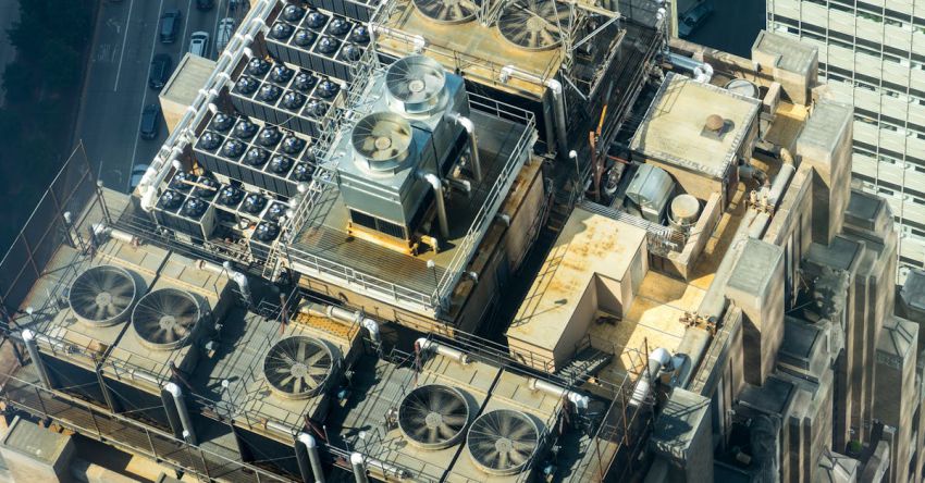 Air Conditioner - Aerial Photography of Brown Concrete Building